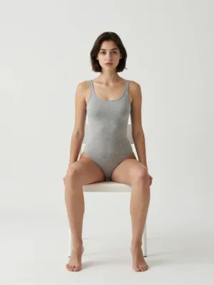 Seated — Legs Apart, Hands on Thighs