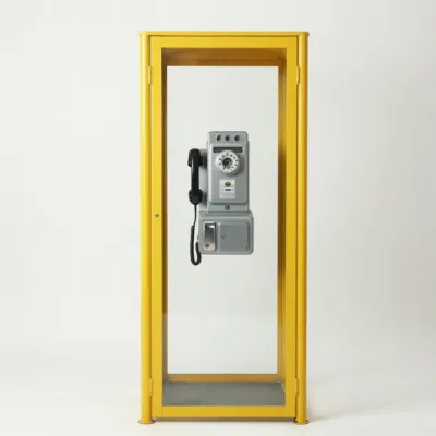 Telephone booth — yellow painted steel, weathered glass